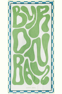 Byron Bay Pastel sand-free beach towel in soft eucalyptus green by Lost Sol, laid flat on a yellow background