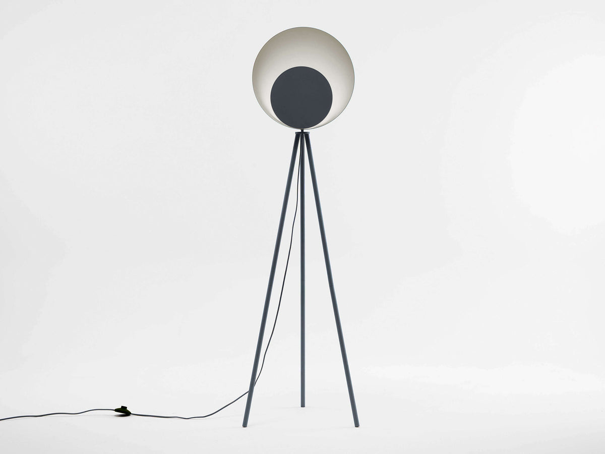 A charcoal grey tripod base suspends an oversized charcoal grey dome head with a diffused, integrated LED light. Light off.