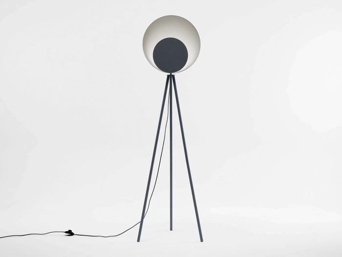 A charcoal grey tripod base suspends an oversized charcoal grey dome head with a diffused, integrated LED light. Light off.