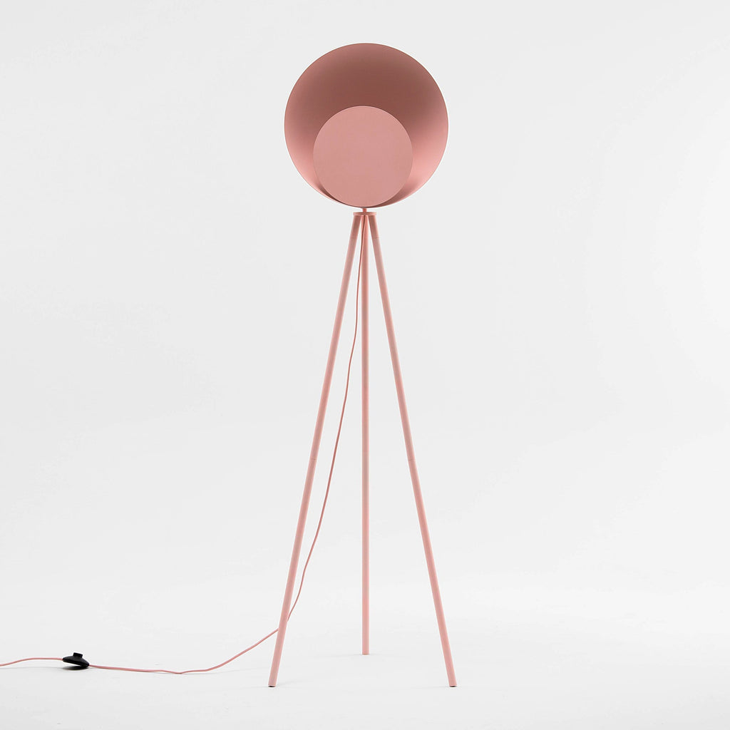 A pink tripod base suspends an oversized pink dome head with a diffused, integrated LED light. Light off.