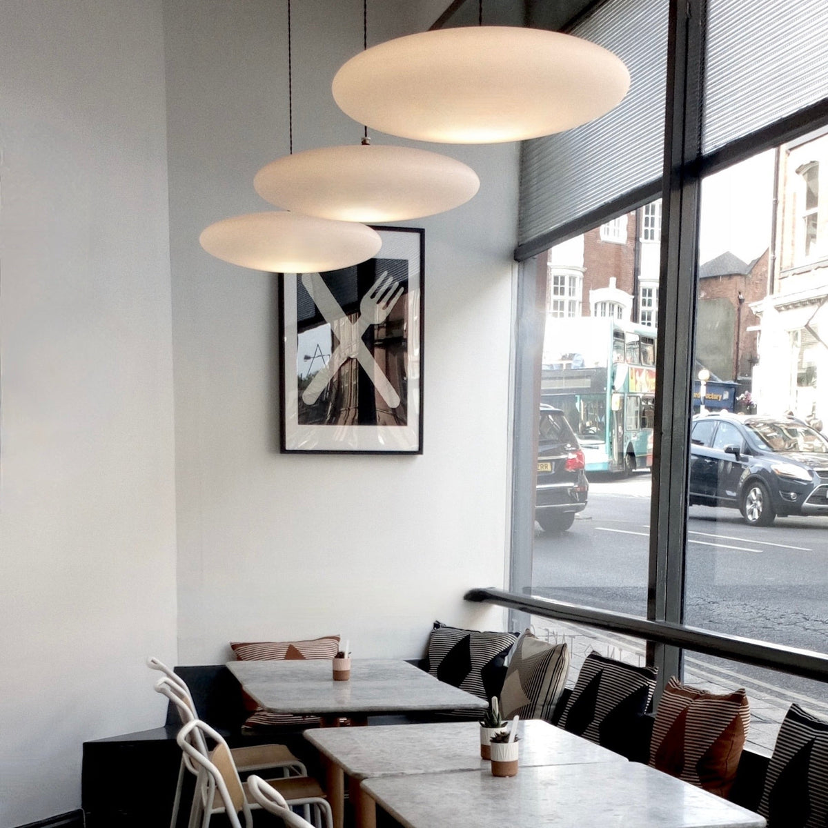Ethel 3 in a Line Suspension Light by One Foot Taller — three opal pendants