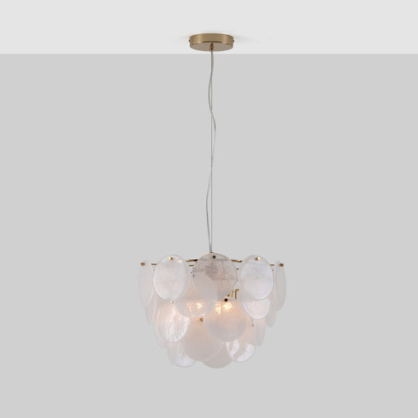 A brass frame suspends circular frosted glass pieces over 4 tiers. The light is switched on.