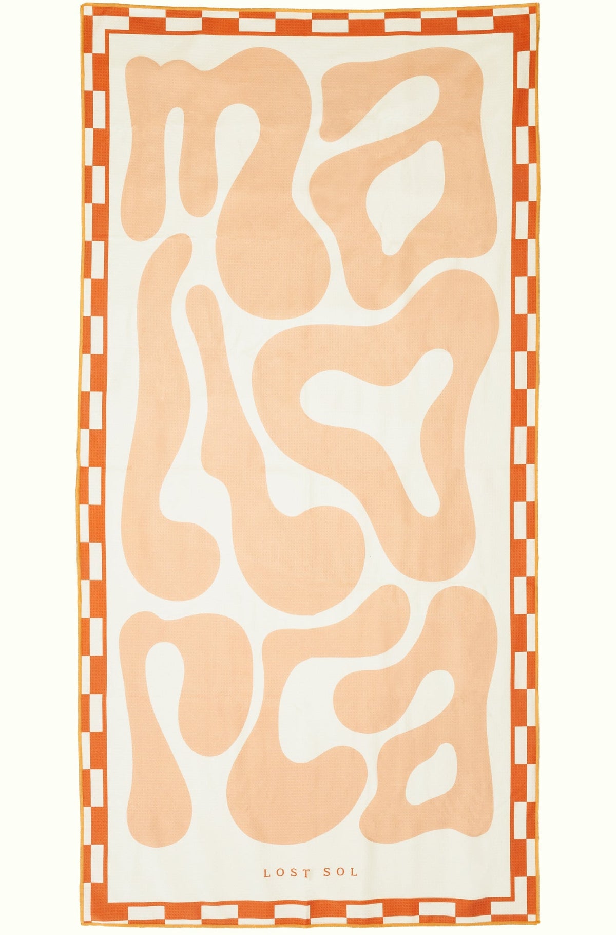 Mallorca Pastel sand-free beach towel in soft peach by Lost Sol, laid flat on a yellow background