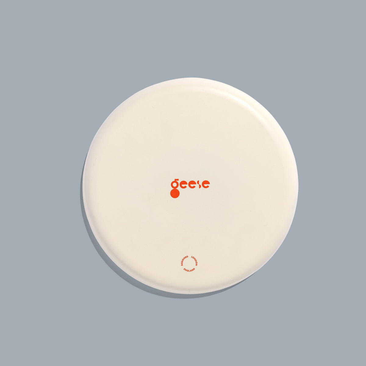 Zest round enamel tray in cream with grey and brown stripes by Geese