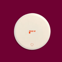 Zest round enamel tray in cream with green and pink stripes by Geese