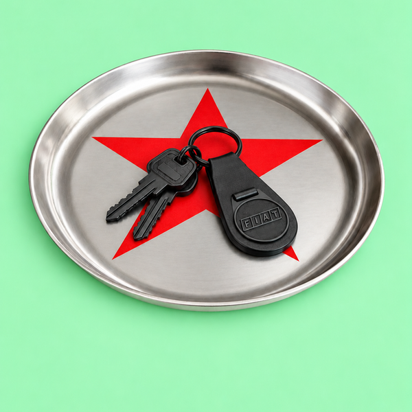 Zeus round enamelled aluminium tray with a red star motif by Geese