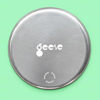Zeus round enamelled aluminium tray with a red star motif by Geese