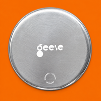 Zeus round enamelled aluminium tray with a cream star motif by Geese
