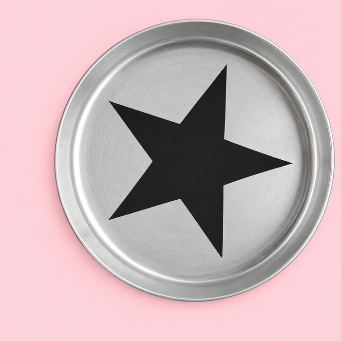 Zeus round enamelled aluminium tray with a black star motif by Geese