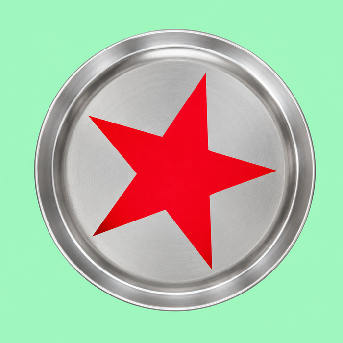Zeus round enamelled aluminium tray with a red star motif by Geese