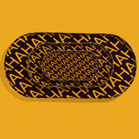 Zaha capsule enamel tray in deep purple with HAHAHA lettering in yellow by Geese