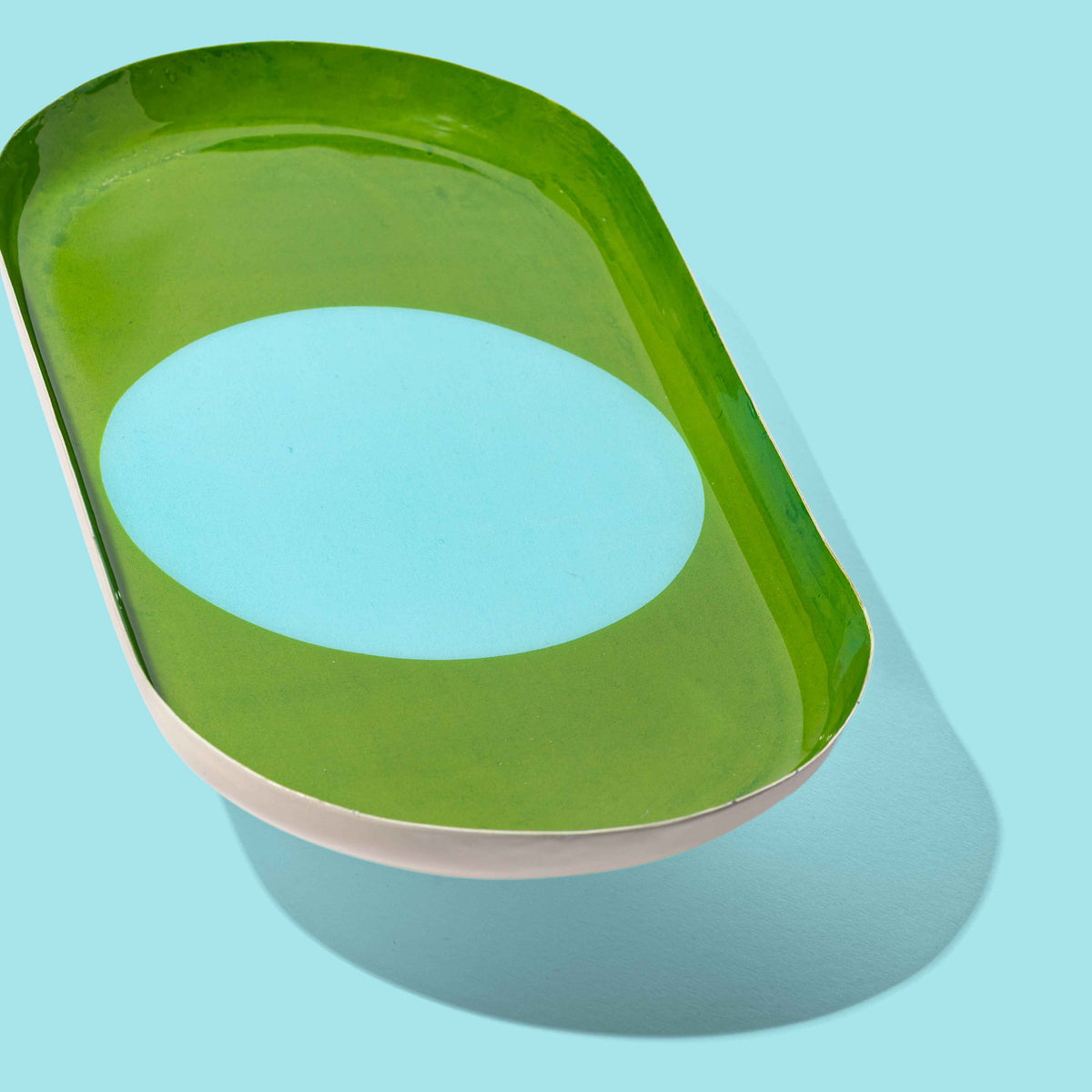 Zen capsule enamel tray in green with a bold blue circle design by Geese