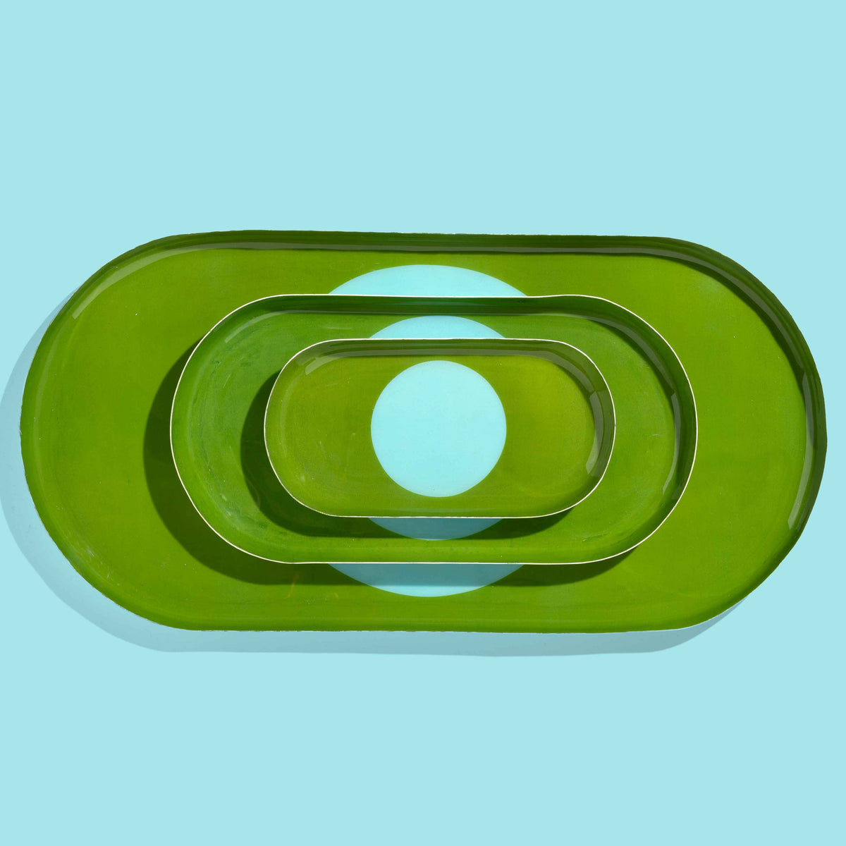 Zen capsule enamel tray in green with a bold blue circle design by Geese