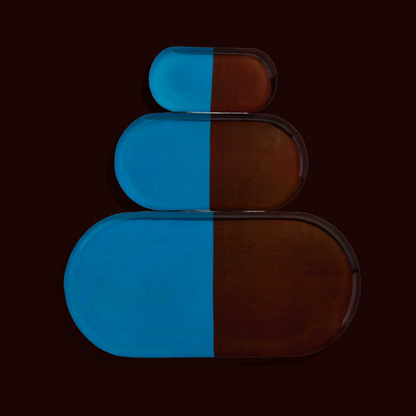 Zephyr capsule enamel tray with a split design in brown and blue by Geese
