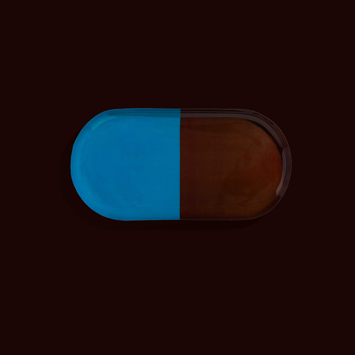 Zephyr capsule enamel tray with a split design in brown and blue by Geese