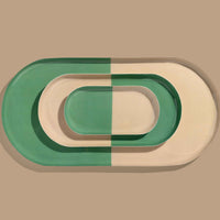 Zephyr capsule enamel tray with a split design in green and cream by Geese