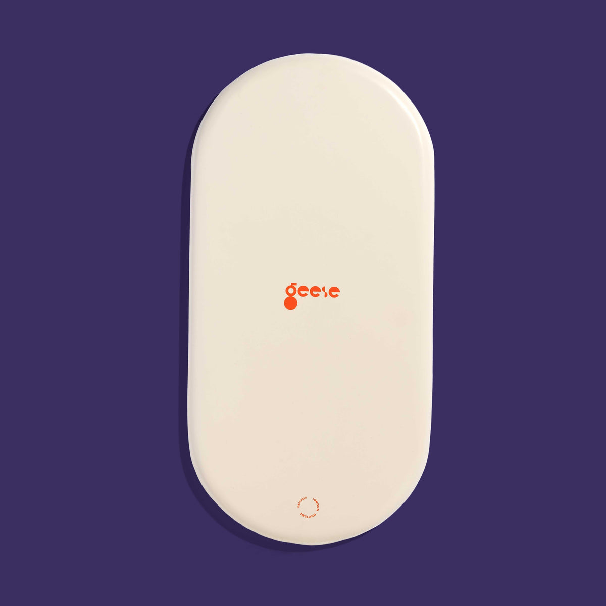 Zephyr capsule enamel tray with a split design in yellow and purple by Geese