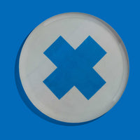 Zeppelin round enamel tray in grey with a contrast blue cross design by Geese