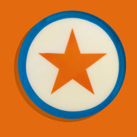 Zodiac round enamel tray in cream with an orange star and blue rim by Geese
