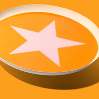 Zodiac round enamel tray in orange with a pale pink star and rim by Geese