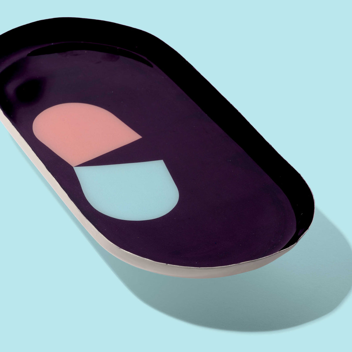 Zombie capsule enamel tray in deep purple with a blue and pink split pill design by Geese