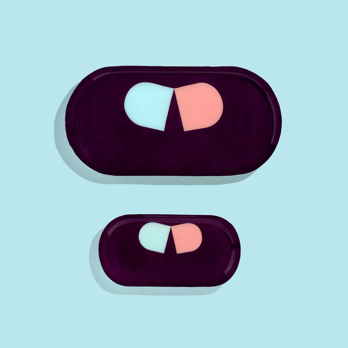 Zombie capsule enamel tray in deep purple with a blue and pink split pill design by Geese