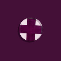Zone round enamel tray in pink with a large purple cross by Geese