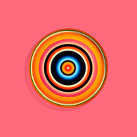 Zoom round enamel tray with multicoloured circles in orange, blue, black and pink by Geese