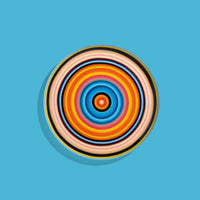 Zoom round enamel tray with multicoloured circles in pink, blue, orange, yellow and black by Geese