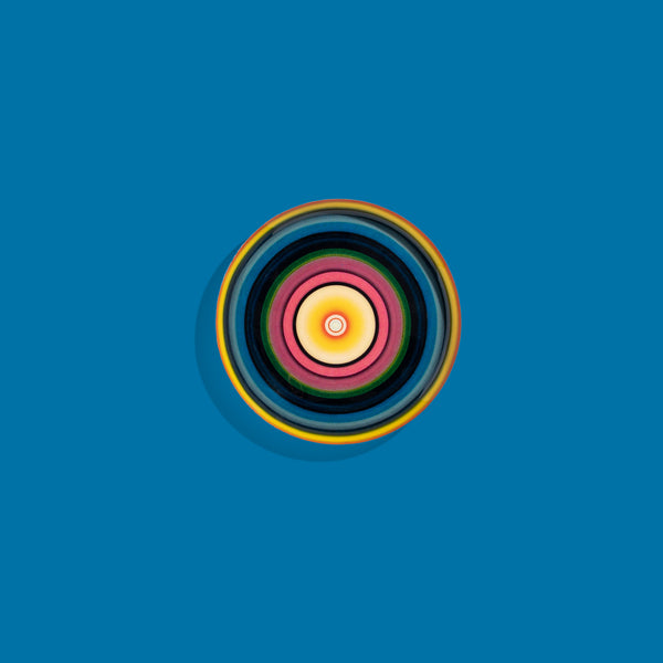 Zoom round enamel tray with multicoloured circles in blue, pink, yellow and green by Geese