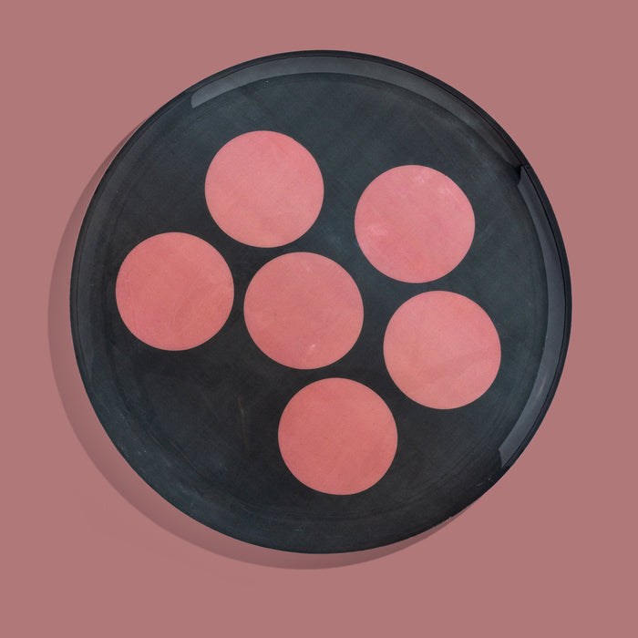 Zulu round enamel tray in dark grey with six pink dots by Geese