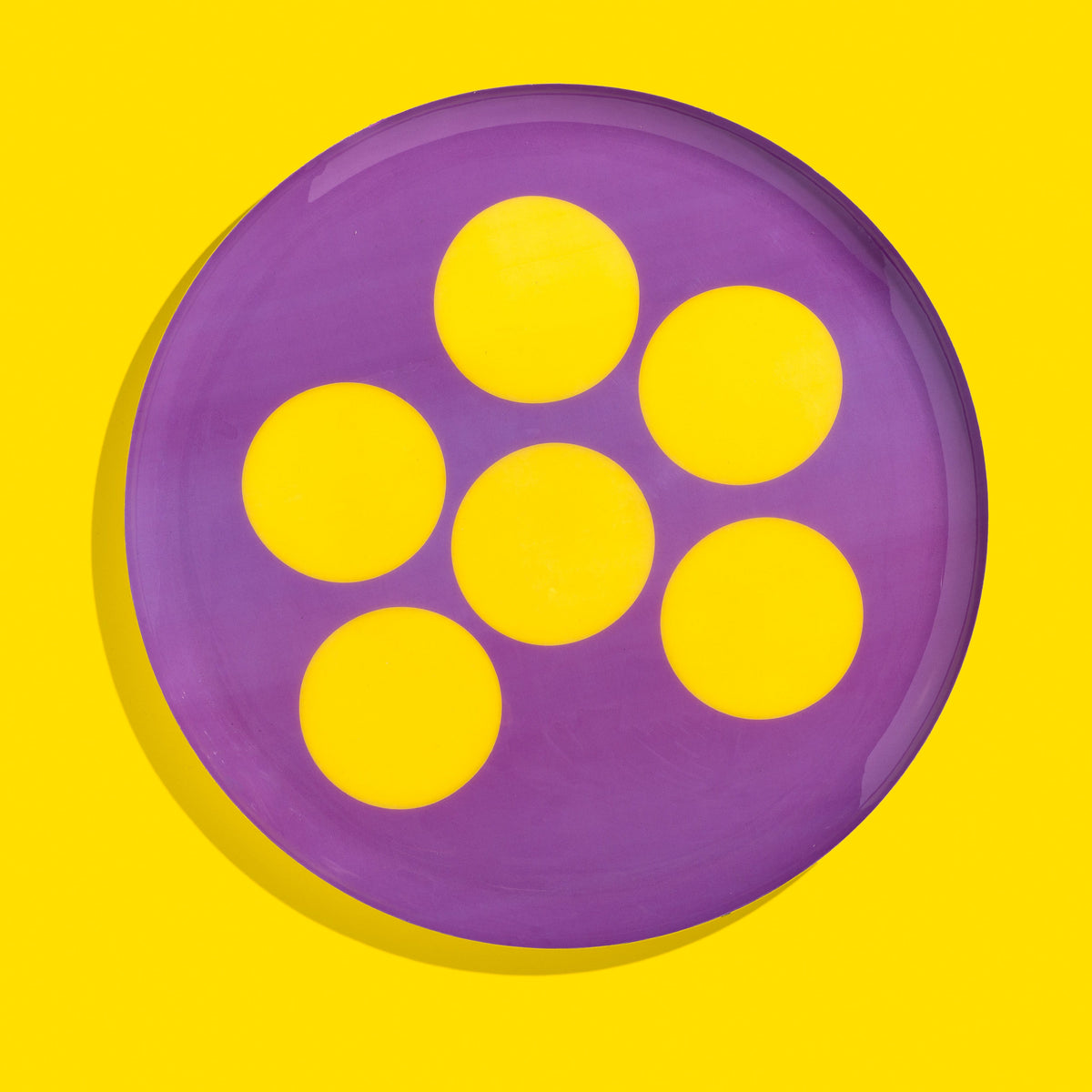Zulu round enamel tray in purple with six yellow dots by Geese