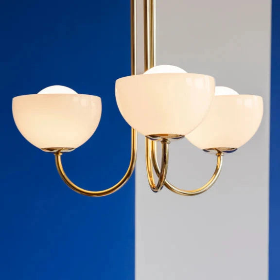 brass three light ceiling pendant with three bowls and globes