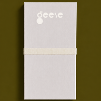Zen capsule enamel tray in cream with a bold olive circle design by Geese