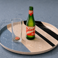 Zest round enamel tray in cream with grey and brown stripes by Geese