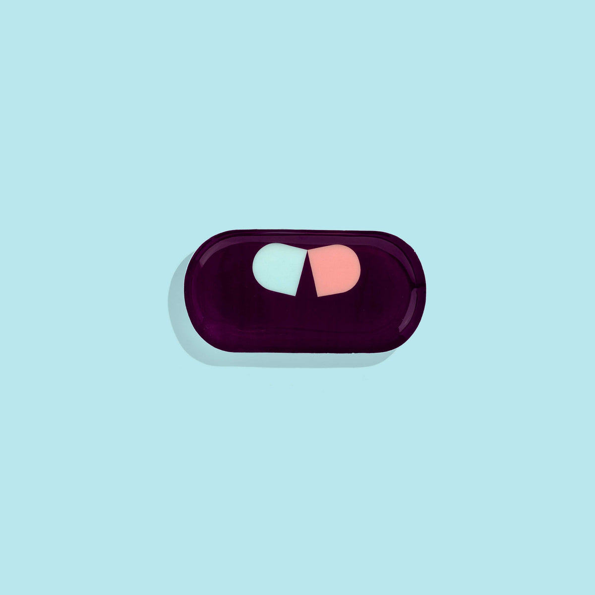 Zombie capsule enamel tray in deep purple with a blue and pink split pill design by Geese