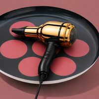 Zulu round enamel tray in dark grey with six pink dots by Geese